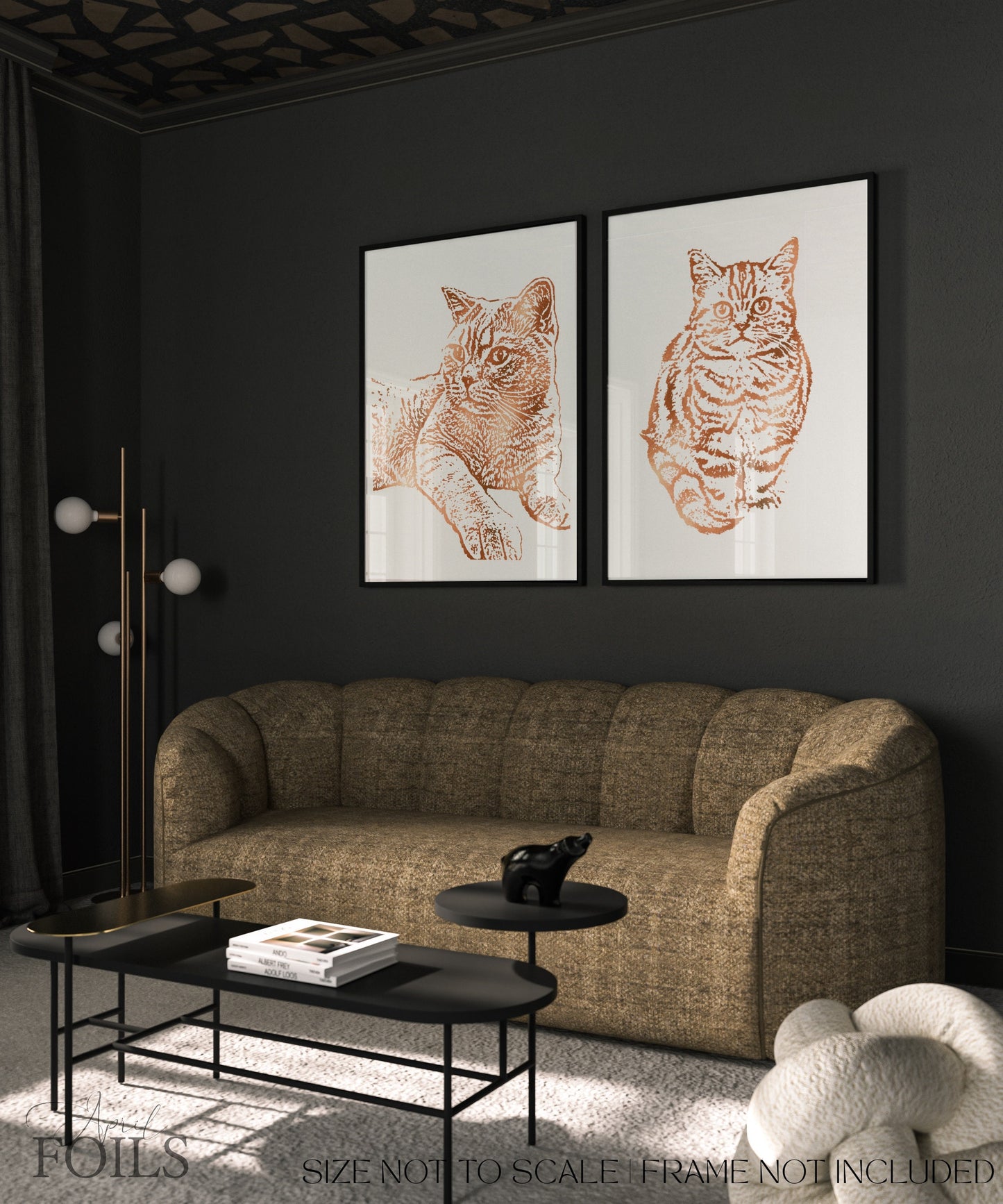 Living room with a brown sofa, black coffee table, and two framed animal prints on a dark wall.